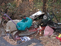trash dumped in forest