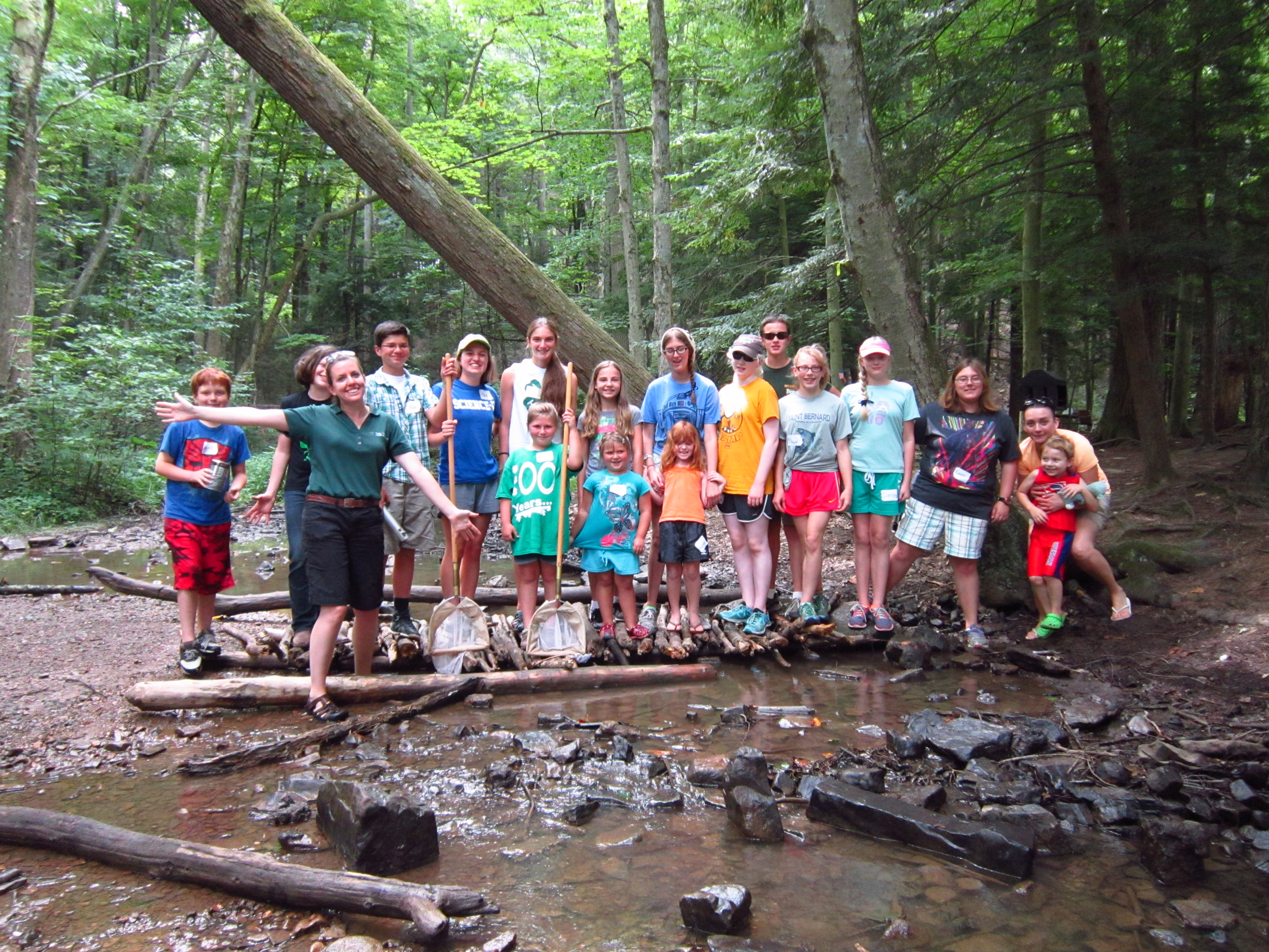 Group shot of kids in a stream