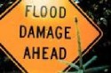 flood damage ahead sign
